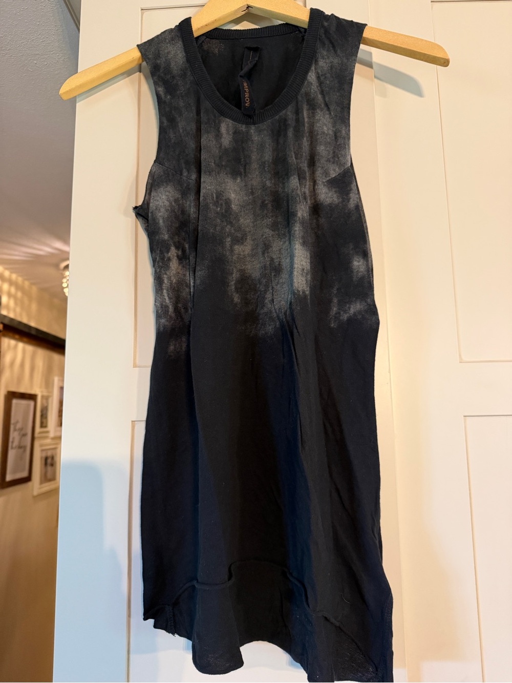 Improvd black on bottom kind of tie dyed on top, longer in back, size S